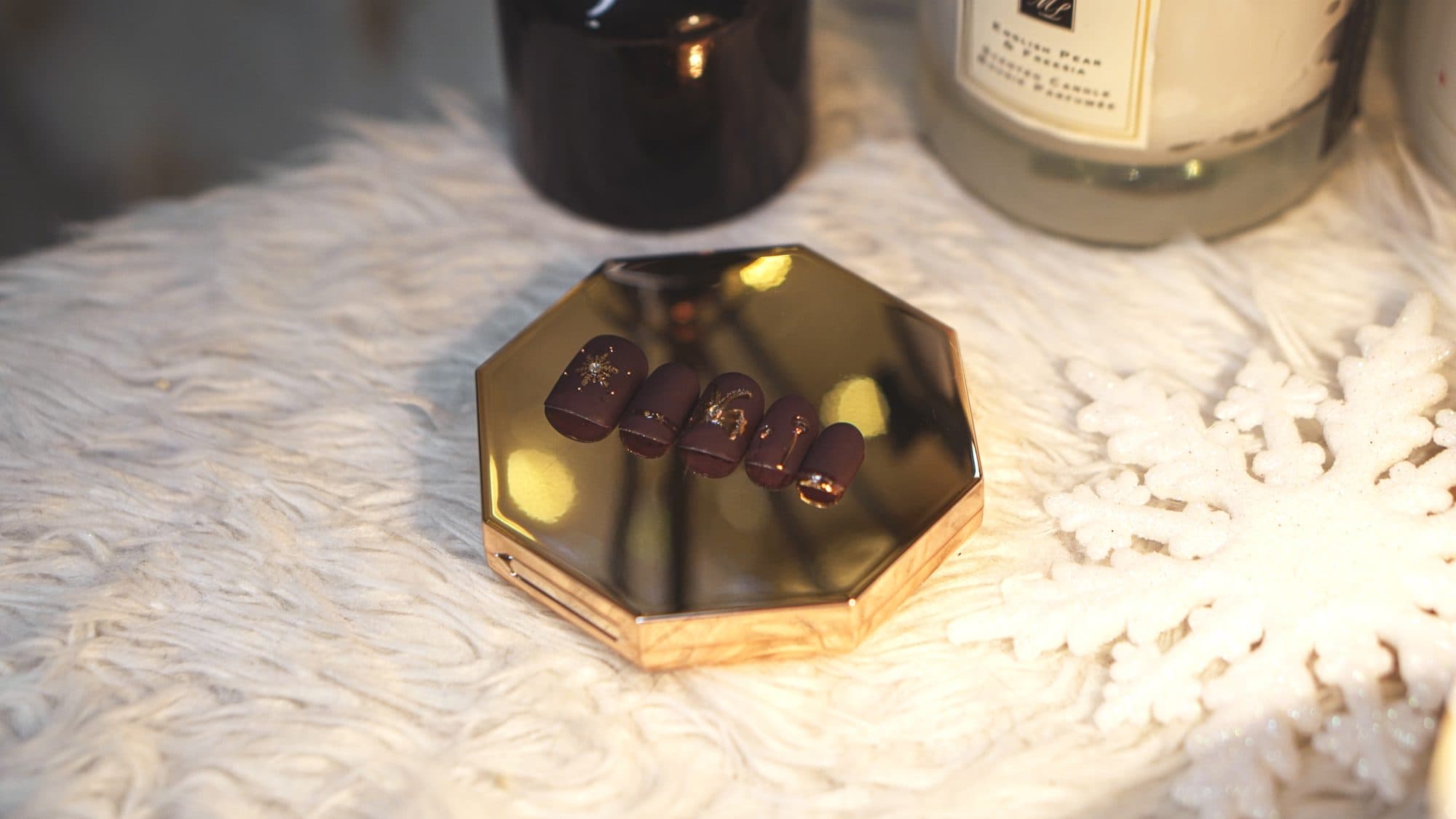 Yule Dreams — burgundy crystal set on rose-gold compact